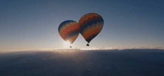 Səmada ADRENALİN: İki şar arasına ip keçirdi və... - FOTO