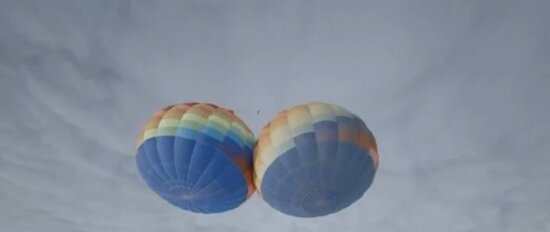 Səmada ADRENALİN: İki şar arasına ip keçirdi və... - FOTO