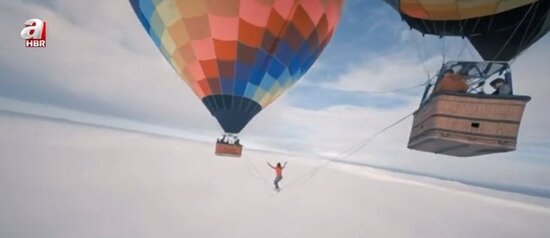 Səmada ADRENALİN: İki şar arasına ip keçirdi və... - FOTO