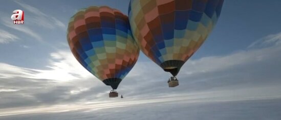 Səmada ADRENALİN: İki şar arasına ip keçirdi və... - FOTO