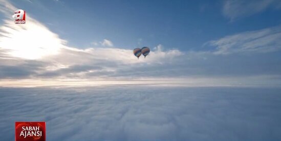Səmada ADRENALİN: İki şar arasına ip keçirdi və... - FOTO