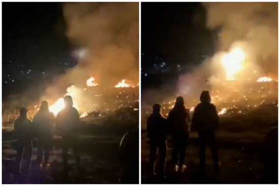 Qadının üzərinə yanan təkər atdılar - VİDEO