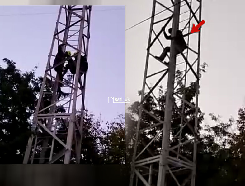 Vağzalda kişi intihar etmək üçün işıq dirəyinə çıxdı - VİDEO