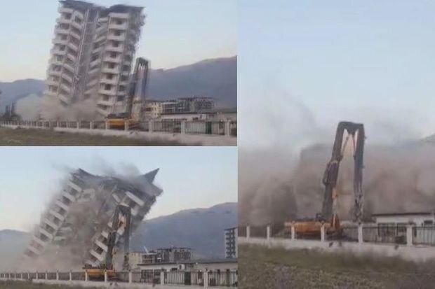 11 mərtəbəli binanı kəndirlə dartaraq uçurdular - VİDEO