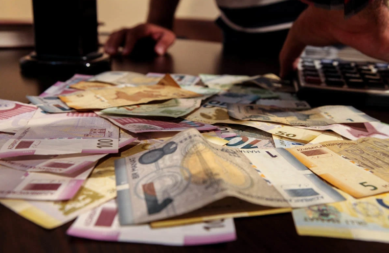 Zədələnmiş pul harada və necə dəyişdirilir?