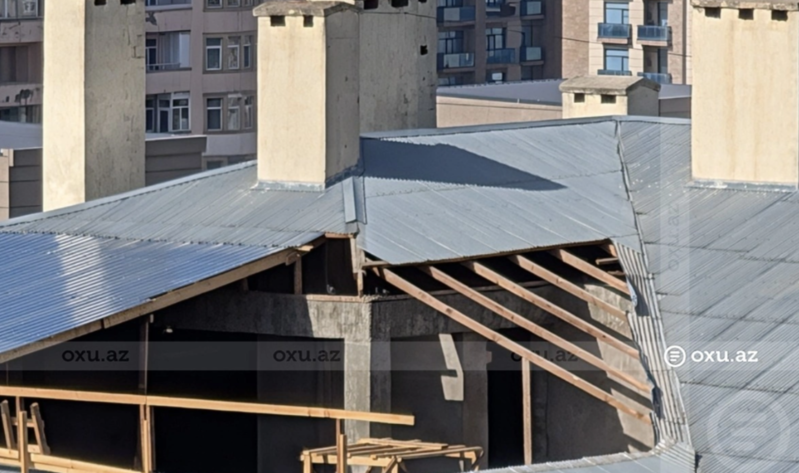 Bakıda çoxmərtəbəli binanın damında qanunsuz tikinti işləri DAYANDIRILDI