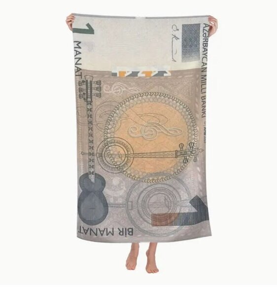 Üzərində manatın əks olunduğu dəsmallar - Qanun buna nə deyir?