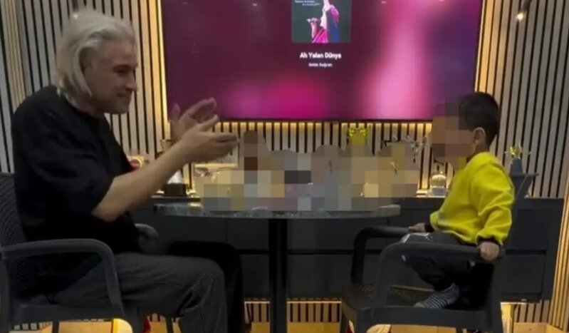 3 yaşlı övladını spirtli içki masasında oturdan ata saxlanıldı - VİDEO