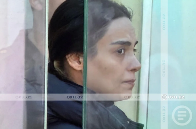 Ərini güllələyərək həyətdə basdırmaqda təqsirləndirilən qadın: "Səhərə qədər yer qazmışam"