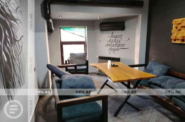 Deputat Arzuxan Əlizadənin Bakıdakı kafedə qətl törədən oğlunun fotosu - Video