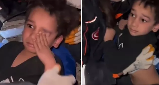 Dağıntılar altında yuxuya gedən uşaq: "Nə baş verir" - VİDEO