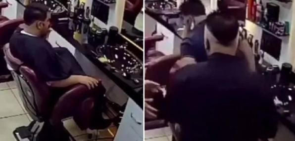 Bərbər əlindəki stəkanı və şokoladı yerə atan müştəriyə şillə vurdu - VİDEO