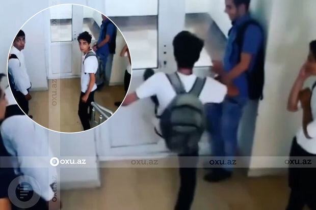Şagird məktəbdə qapını təpiklə açdı - VİDEO