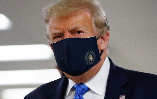 Tramp etiraz aksiyalarında maska taxmağı qadağan etdi