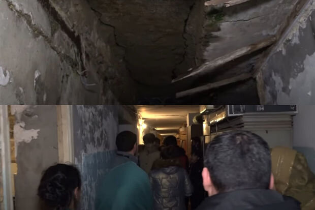 Binəqədidə beton hissələri sökülən binada gərgin anlar yaşandı: Əhali yolu bağladı - VİDEO