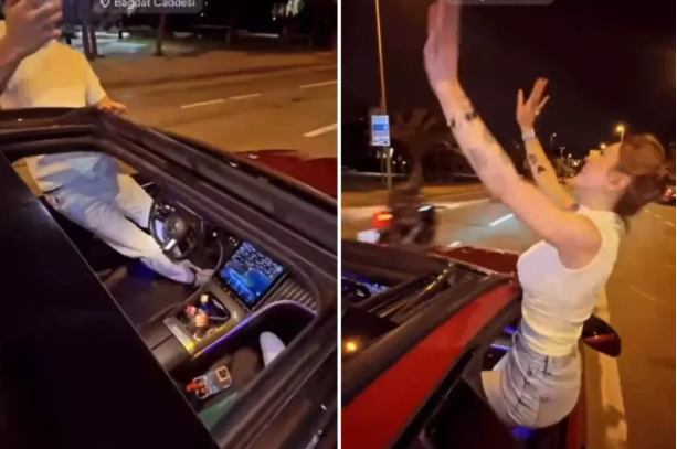 Sürücü maşın idarə edərkən pəncərədən çıxıb rəqs etdi - VİDEO