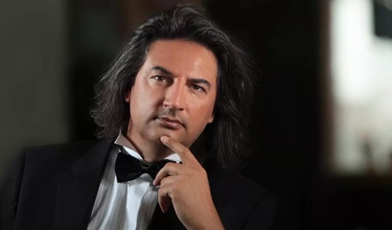 "Dənizdə bir su damlasıyam"