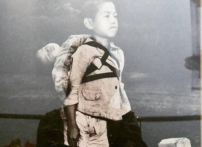 Qardaşının meyitini daşıyan balaca oğlan - Bütün dünyanı ağladan FOTOnun acı tarixçəsi