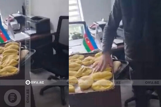 Azərbaycanda məmurun masasını acımış xəmirlə doldurdular - VİDEO