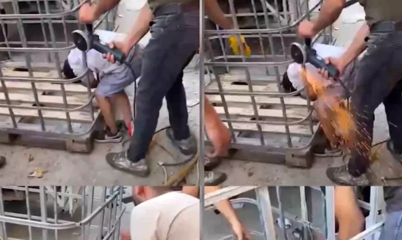 Uşaq dəmir qəfəsin barmaqlıqları arasında sıxışıb qaldı - VİDEO