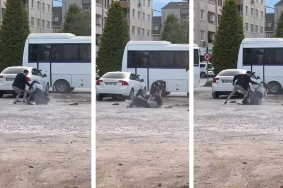 İki gənc qız dayanacaqda yumruq-yumruğa dalaşdı - ViDEO