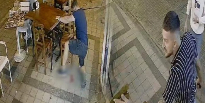 Polisin gözü önündə mübahisə etdiyi şəxsi güllələdi