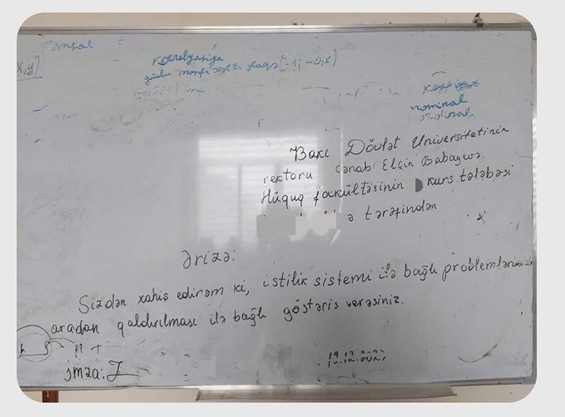Üşüyən BDU tələbələri rektora lövhədə ərizə yazdılar - FOTO