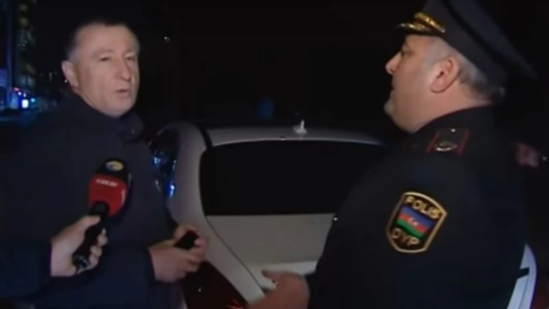 Bakıda polis deputatı saxladı - Mübahisə düşdü - VİDEO