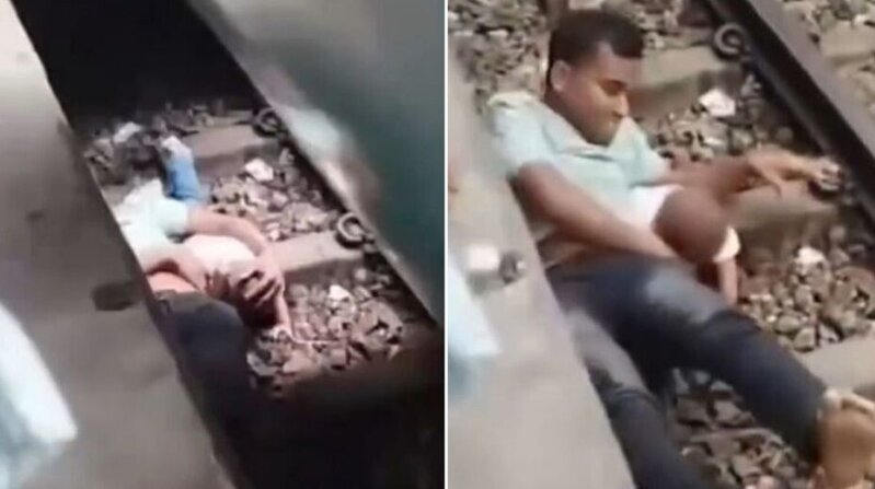 Möcüzəvi xilas: Ata özünü relslərə atıb uşağını qorudu - VİDEO