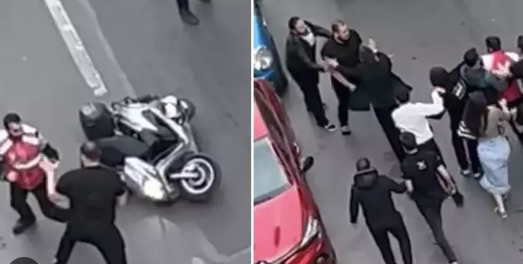 Motosiklet sürücüsü ilə kuryer küçə ortasında əlbəyaxa dava etdi - VİDEO