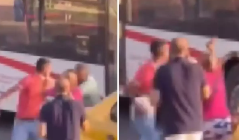 Taksi sürücüsü ilə sərnişin arasında əlbəyaxa dava - VİDEO