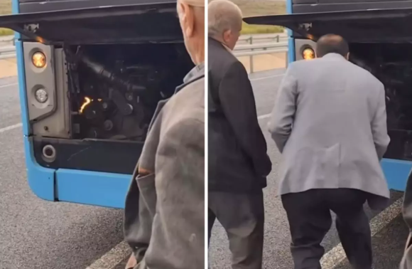 Avtobusun mühərrikində çıxan yanğını üfləyərək söndürməyə çalışdı - VİDEO