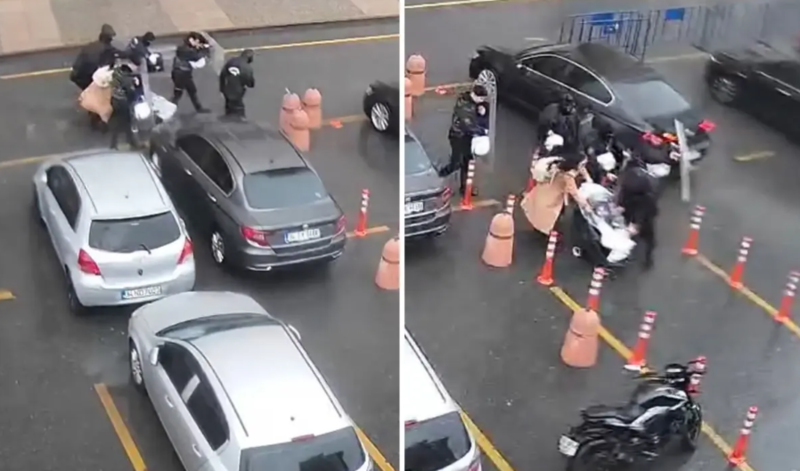 Polis fırtına zamanı ana və körpəsini qalxanla qorudu - VİDEO